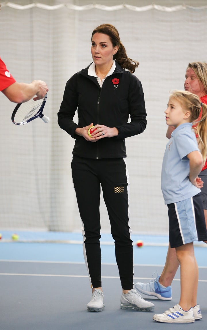 The Duchess of Cambridge takes part in a Tennis for Kids session during a visit at the Lawn Tennis Association at the National Tennis Centre on Oct. 31, 2017.