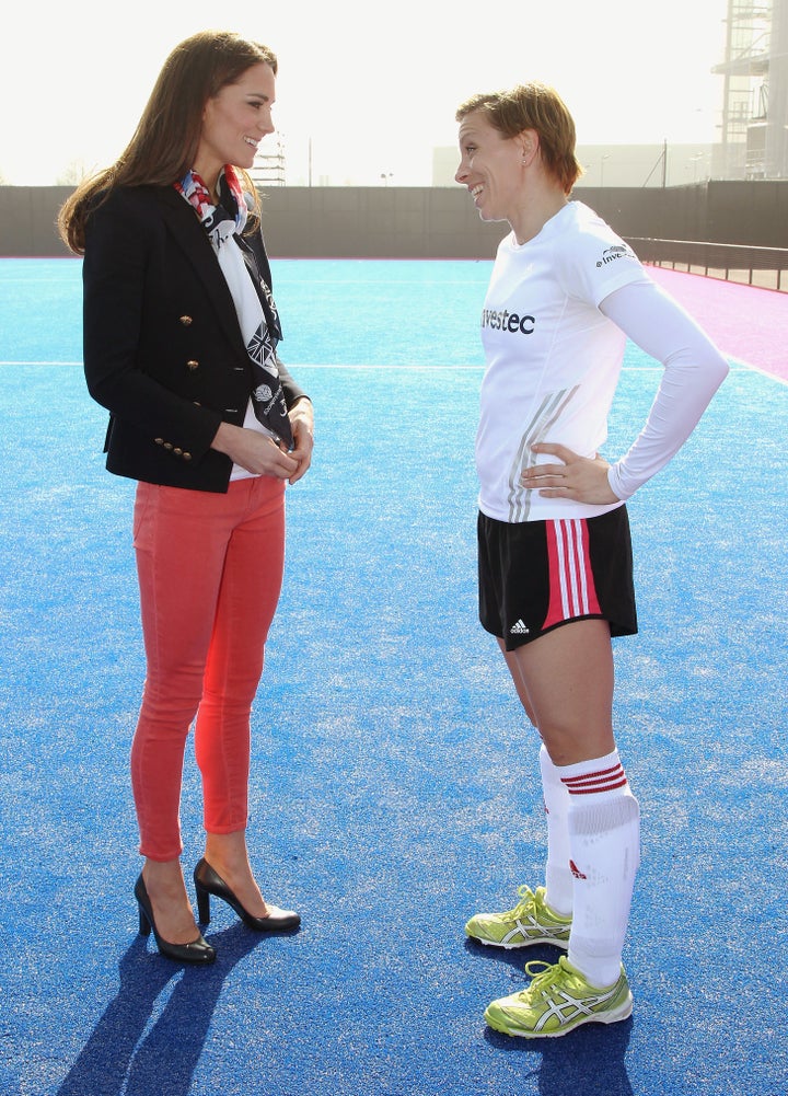 Women's Team GB hockey captain Kate Walsh and Catherine, Duchess of Cambridge chat in Olympic Park on March 15, 2012, in London.