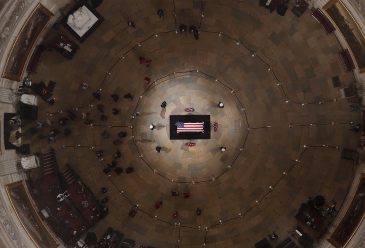 Members of the public are seen inside the Capitol Rotunda as former President George H.W. Bush lies in state on Wednesday ahead of his memorial service. 