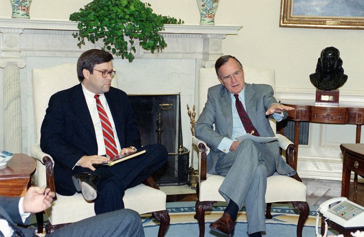 William Barr, left, is seen in 1992 with President George H.W. Bush when Barr was serving as U.S. attorney general.