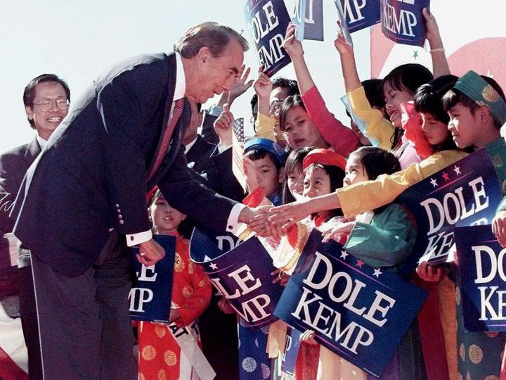 Dole greets students at Van Lang Vietnamese School in San Jose, California, while he was a presidential candidate in October 1996.