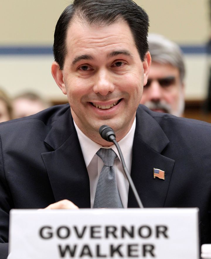 Gov. Scott Walker (R) said he was trying to "divide and conquer" Wisconsin by gutting public employee unions in 2011.