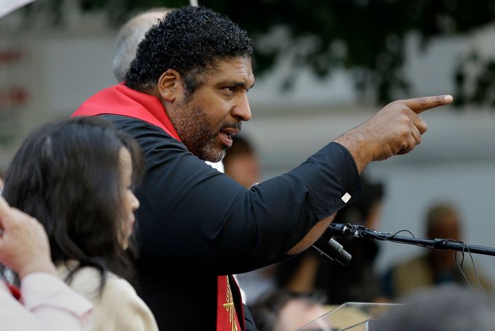 Rev. William Barber, President of the North Carolina Chapter of the NAACP, leads a Moral Monday protest against actions taken by the state's Republican legislature including enacting a racial gerrymander and limiting voting rights.