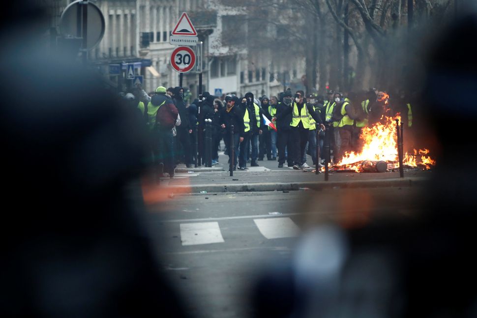Fires flashed during Saturday's riots in Paris.