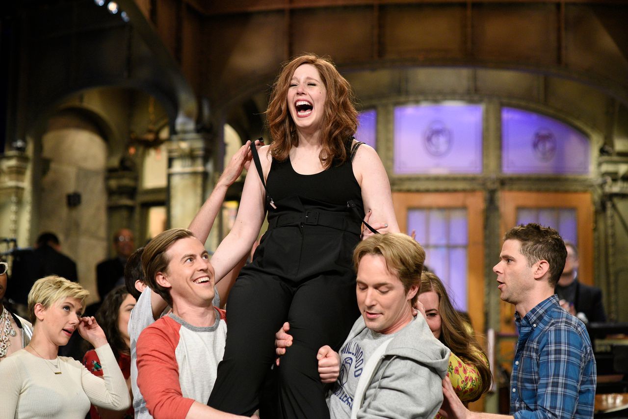 Vanessa Bayer getting carried off stage after her last "SNL" show on May 20, 2017. 