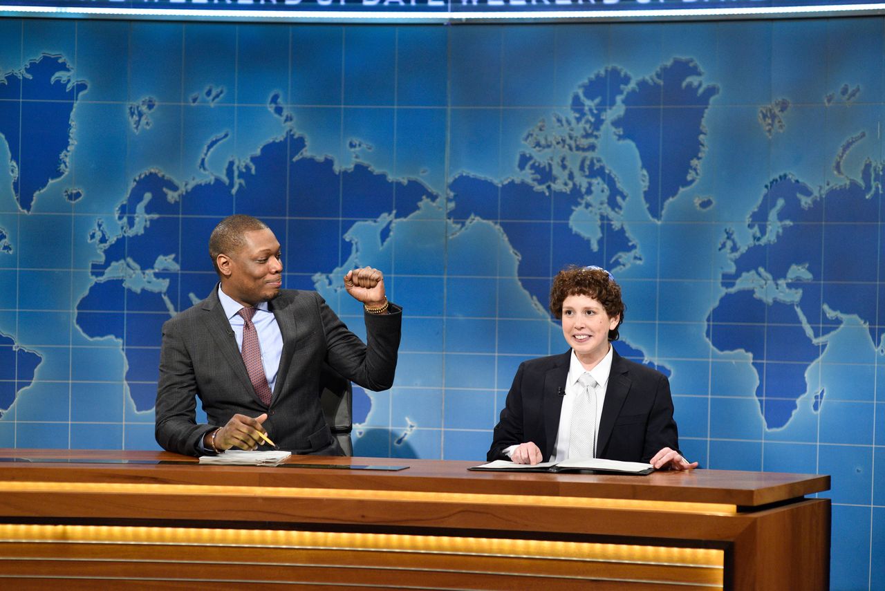 Michael Che and Vanessa Bayer as 'Jacob the Bar Mitzvah Boy' during "Weekend Update" on "SNL" on April 15, 2017.
