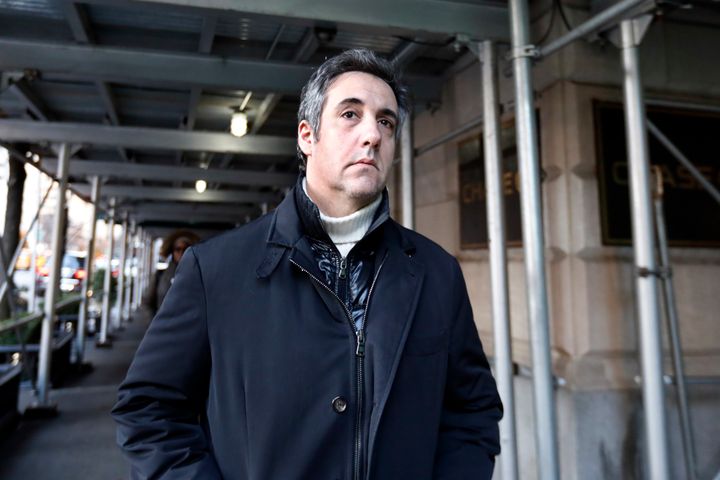Michael Cohen, former lawyer to President Donald Trump, leaves his apartment building on New York's Park Avenue, Friday, Dec. 7, 2018. (AP Photo/Richard Drew)