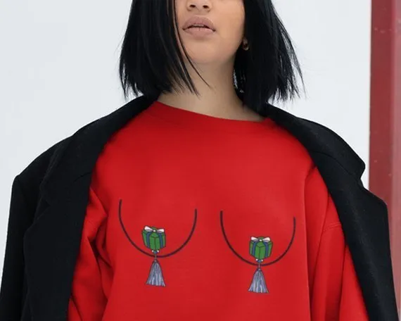 Snow globe nipple sweaters - Useless Things to Buy!