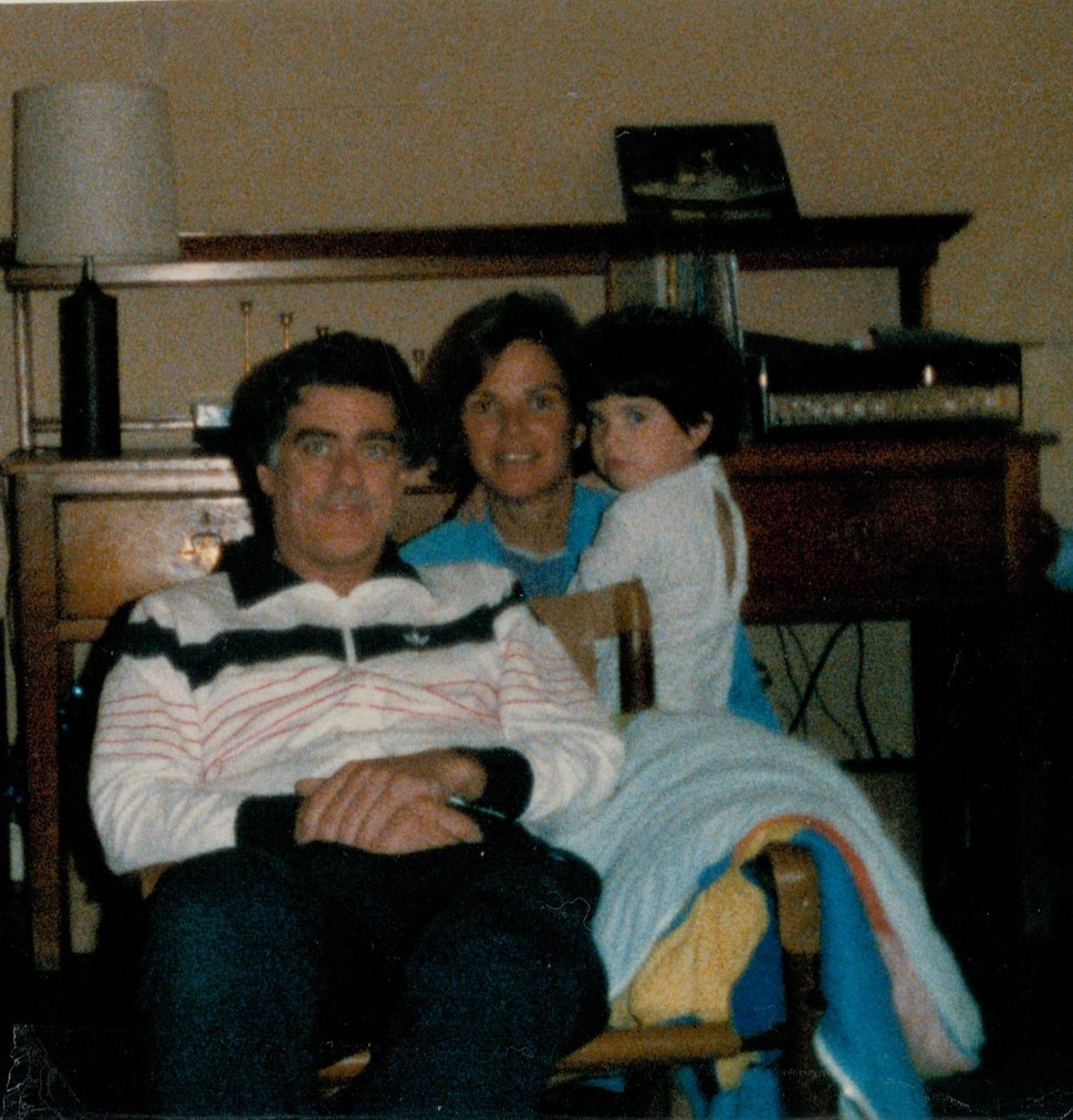 Reilly with her parents a few years after she was born.