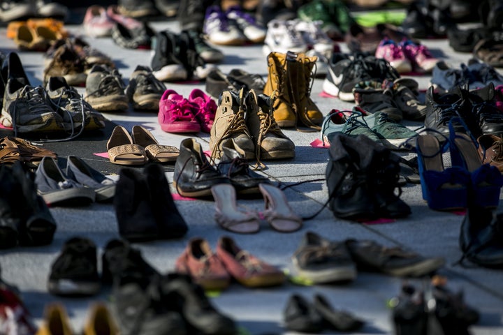 Empty pairs of shoes representing those killed because of Hurricane Maria, outside the Capitol in San Juan, Puerto Rico, June