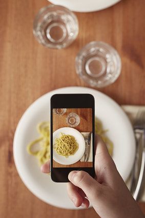 Your food goes cold because you're too busy taking Instagram photos of it