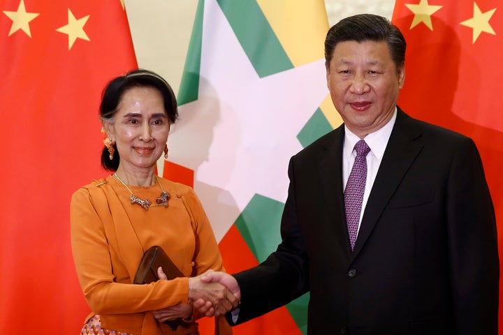 Myanmar State Counsellor Aung San Suu Kyi (left, with Chinese President Xi Jinping) is often cited as an example that women have equal opportunity in Myanmar. 