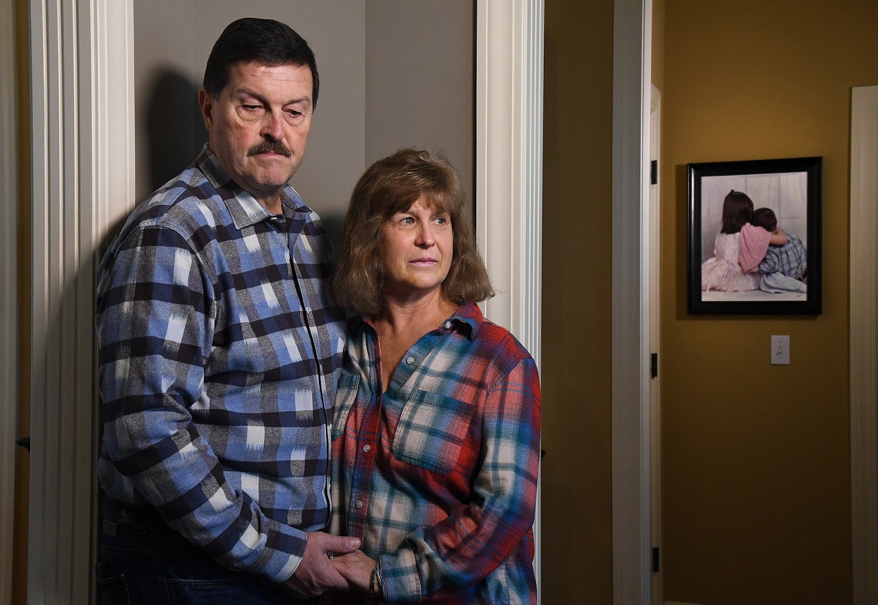 Nathan and Sylvia Harrell lost their 17-year-old son, Chad, to suicide. A favorite photo (right) shows Chad as a 2-year-old being comforted by his older sister, Melanie.