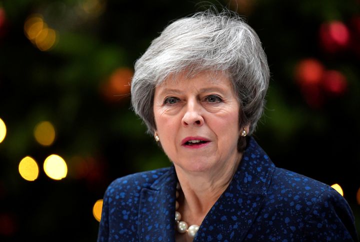 Britain's Prime Minister Theresa May addresses the media after it was announced that the Conservative Party will hold a vote of no confidence in her leadership.