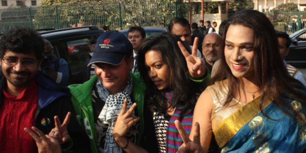 SUPREME COURT, NEW DELHI, INDIA - 2016/02/02: Members of the LGBT community Show Victory Sign outside Indias Supreme Court, Indias top court agreed February 2 to review a law outlawing gay sex, sparking hope among campaigners that the legislation dating back to the 19th century will eventually be overturned in the worlds biggest democracy in new Delhi. (Photo by Wasim Sarvar/Pacific Press/LightRocket via Getty Images)