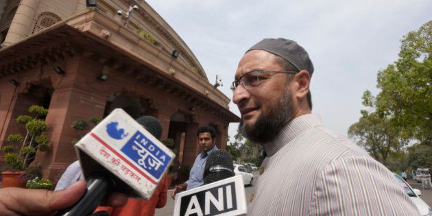 NEW DELHI, INDIA - MARCH 15: AIMIM President Asaduddin Owaisi during the Parliament Budget Session on March 15, 2016 in New Delhi, India. The Lok Sabha discussed The Real Estate Regulator (Regulation and Development) Bill that seeks to protect the interests of property buyers against unscrupulous promoters and set up a sectoral watchdog. The bill, pending before the Parliament since 2013, got approval of the Rajya Sabha on March 10. (Photo by Sonu Mehta/Hindustan Times via Getty Images)