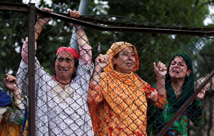 Kashmiri women mourn the death of Burhan Wani, a separatist militant leader, during his funeral in Tral, south of Srinagar, July 9, 2016. REUTERS/Danish Ismail