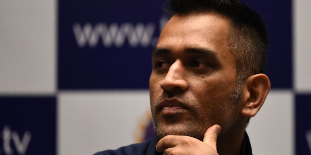 Indian ODI and T20 cricket captain Mahendra Singh Dhoni gestures during a press conference on the eve of the Indian tour of Zimbabwe, in Mumbai on June 7, 2016. / AFP / INDRANIL MUKHERJEE (Photo credit should read INDRANIL MUKHERJEE/AFP/Getty Images)