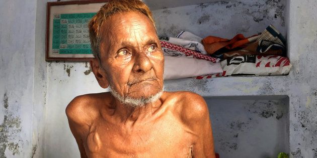 File photo of Mohammad Hashim Ansari, the oldest litigant in a case seeking to preserve Muslim claim on a disputed religious site, sitting inside his house at a Muslim neighbourhood in Ayodhya.