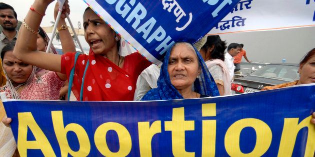 Women attend a rally against abortion in the southern Indian city of Hyderabad October 2, 2008. REUTERS/Krishnendu Halder (INDIA)