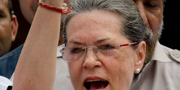 Indiaâs opposition Congress party president Sonia Gandhi shouts slogans against the government during a protest in the parliament premises. (AP Photo/ Manish Swarup)