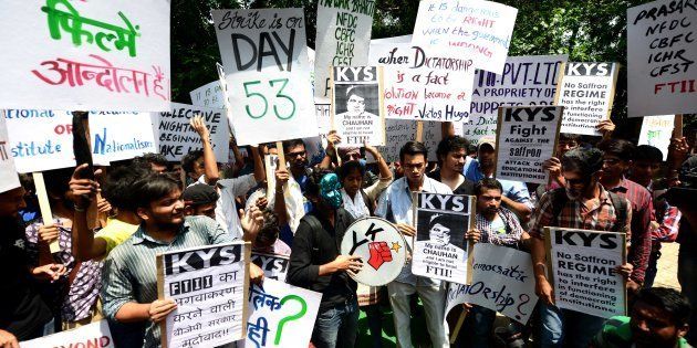 NEW DELHI, INDIA - AUGUST 3: FTII students supported by other student unions protest at Jantar Mantar against Gajendra Singh's appointment on August 3, 2015 in New Delhi, India. (Photo by Ramesh Pathania/Mint via Getty Images)