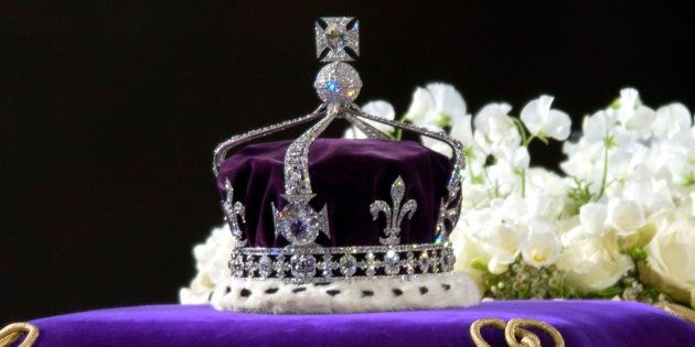 A Close-up Of The Coffin With The Wreath Of White Flowers And The Queen Mother's Coronation Crown With The Priceless Koh-i-noor Diamond.