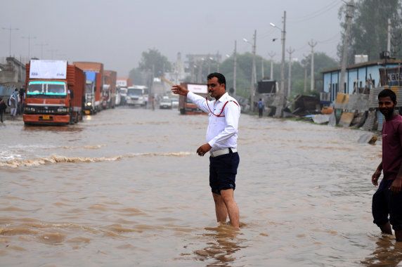 Hero Honda chowk in Gurgaon was submerged in four feet-deep water, causing commuters to be stuck in traffic for more than 14 hours, on 29 July, 2016.