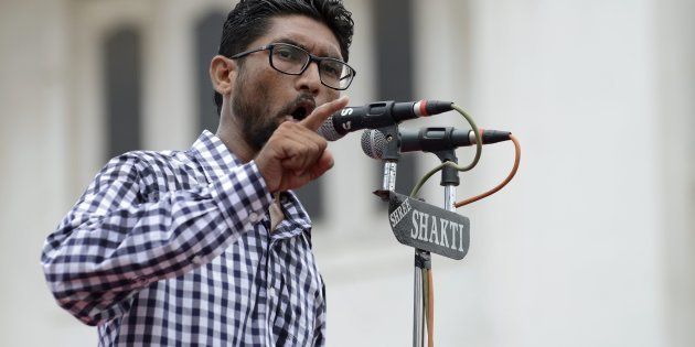 Activist and member of Dalit community, Jignesh Mewani addresses a protest rally against an attack on Dalit caste members in the Gujarat town of Una, in Ahmedabad on July 31, 2016.