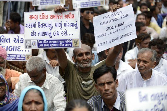 Members of the Dalit community join attend a protest rally against an attack on Dalit caste members in the Gujarat town of Una, in Ahmedabad on July 31, 2016.
