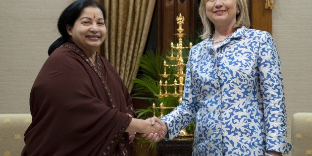 Hillary Clinton, right, shakes hands with J. Jayalalithaa at the Fort St. George Complex in Chennai, in July 2011. (AP Photo/Saul Loeb, Pool)