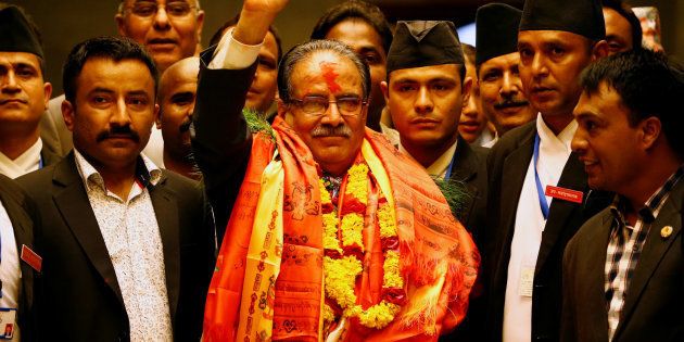 Nepal's newly elected Prime Minister Pushpa Kamal Dahal, also known as Prachanda, waves towards the media after he was elected Nepal's 24th prime minister in 26 years, in Kathmandu, Nepal, August 3, 2016. REUTERS/Navesh Chitrakar TPX IMAGES OF THE DAY