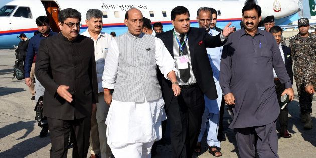 Rajnath Singh, second from left, arrives to attend a meeting of the South Asian Association for Regional Cooperation, in Islamabad, Pakistan, Aug. 3, 2016. (AP Photo)