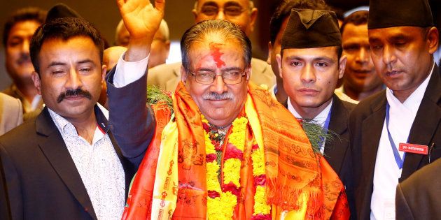 Nepal's newly elected Prime Minister Pushpa Kamal Dahal, also known as Prachanda, waves towards the media in Kathmandu, Nepal, August 3, 2016. REUTERS/Navesh Chitrakar