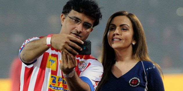 Former cricketer Sourav Ganguly clicks a selfie with Nita Ambani in Kolkata in 2015. (Photo by Prateek Choudhury/Hindustan Times via Getty Images)