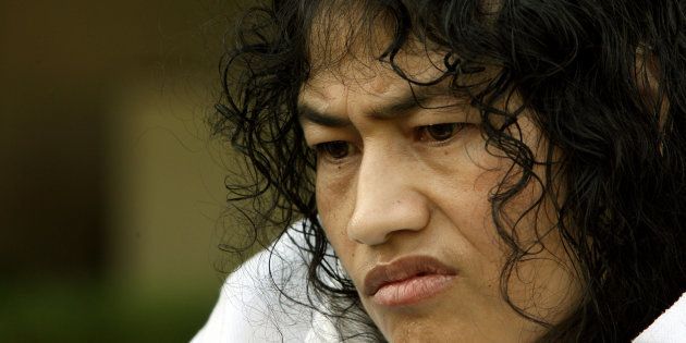 Irom Sharmila Chanu, 34, reacts during an interview with Reuters in New Delhi October 4, 2006.