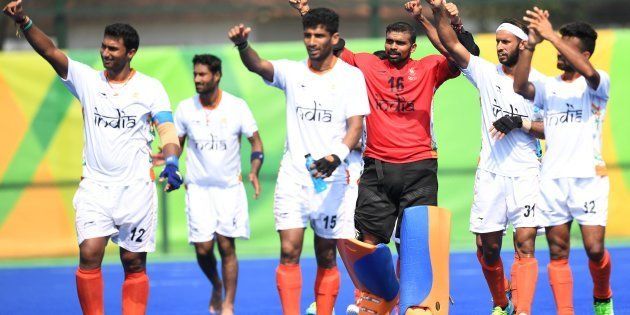 India players celebrate after the men's field hockey Argentina vs India match of the Rio 2016 Olympics Games.