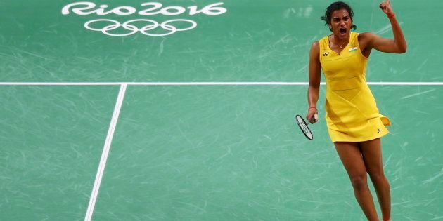 P.V. Sindhu (IND) of India celebrates winning the second set during her match against Wang Yihan (CHN) of China.