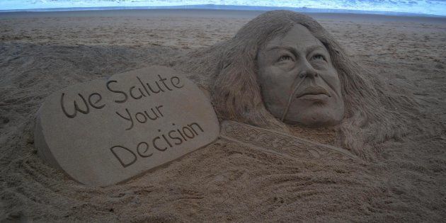 A sand sculpture of Manipurs Iron Lady Irom Chanu Sharmila looks at the Bay of Bengal Seas eastern coast beach at Puri.