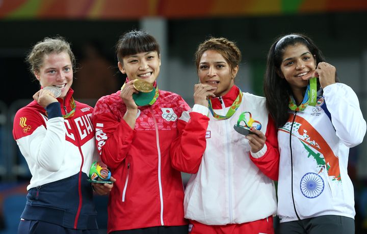 (L-R) Valeriia Koblova (RUS) of Russia, Kaori Icho (JPN) of Japan, Maroua Amri (TUN) of Tunisia and Sakshi Malik (IND) of India pose with their medals