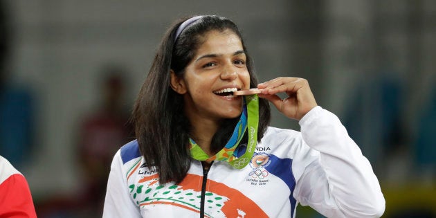 India's Sakshi Malik poses with her bronze
