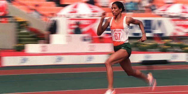 Track star P.T. Usha shown in photo dated 29 September 1986 streaking her way to pass in the women's 200-meter heats with a new Asian games record time of 23.68 secs.