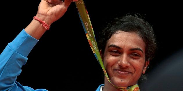2016 Rio Olympics - Badminton - Women's Singles - Victory Ceremony - Riocentro - Pavilion 4 - Rio de Janeiro, Brazil - 19/08/2016. Silver medallist P.V. Sindhu (IND) of India poses with her medal. REUTERS/Alkis Konstantinidis FOR EDITORIAL USE ONLY. NOT FOR SALE FOR MARKETING OR ADVERTISING CAMPAIGNS.