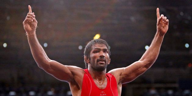 Yogeshwar Dutt celebrates his victory at the London Olympic Games in 2012. REUTERS/Suhaib Salem