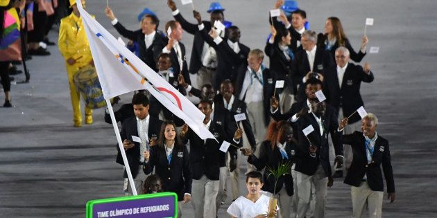 Refugee Olympic Team's Rose Nathike Lokonyen leads her delegation during the opening ceremony of the Rio 2016 Olympic Games.