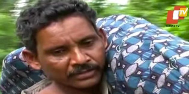 A screen grab of the man from Odisha, Dana Majhi, who carried the body of his dead wife for 10 km as there was no ambulance for him.