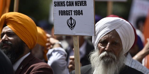 British Sikhs take part in a march and rally in central London June 7, 2015. On the 31st anniversary of the killing of Sikhs during riots in India in 1984, the campaigners were highlighting what they say is continued repression and suppression of the Sikh religion and identity in India. REUTERS/Toby Melville