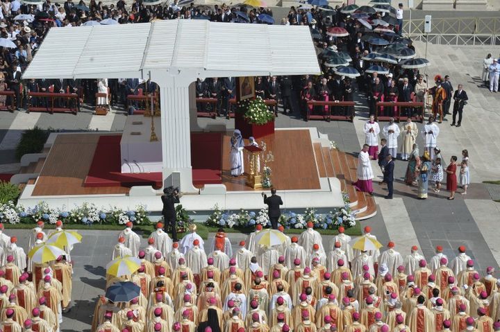 Nuns of the Missionary of Charity prays during a holy mass for canonisation of Mother Teresa.