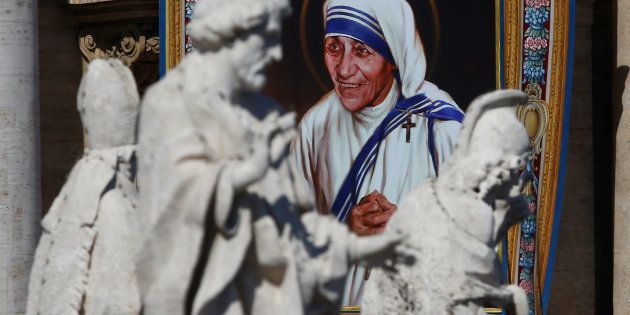 A tapestry depicting Mother Teresa of Calcutta is seen in the facade of Saint Peter's Basilica during a mass, celebrated by Pope Francis, for her canonisation in Saint Peter's Square at the Vatican September 4, 2016.