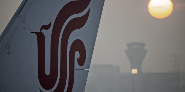 The tail fin of an Air China Ltd. aircraft is seen at Shanghai Hongqiao International Airport in Shanghai, China, on Tuesday, March 15, 2016.